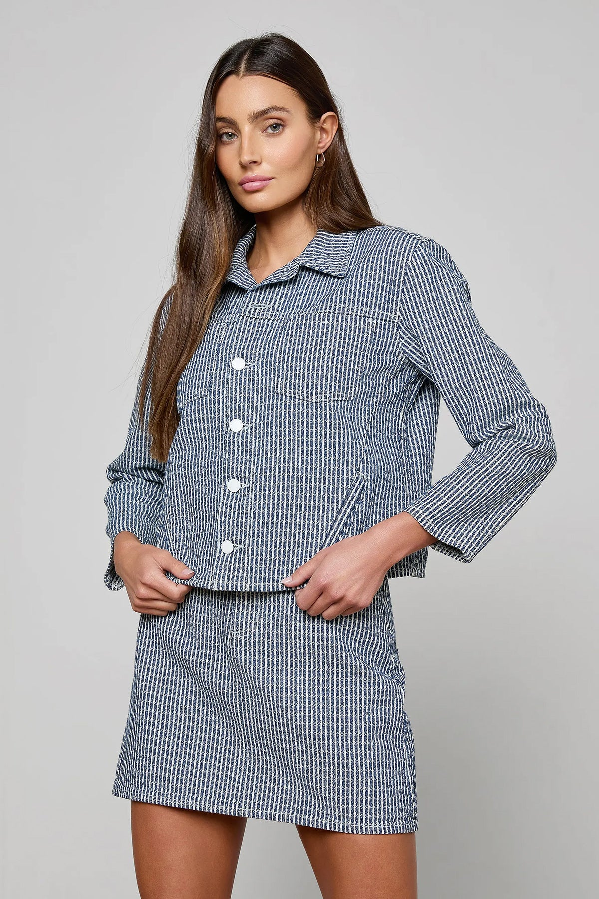 Cropped structured jacket in a blue tone.