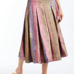 Pleated midi skirt with a soft, flowing silhouette and multicolor tones