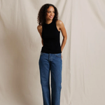 woman in black tank top and denim 