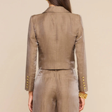Women's cropped blazer in a warm neutral hue featuring long sleeves, tailored lapels, and a structured silhouette.