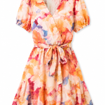 A short-sleeve wrap dress with a tie waist, featuring a vibrant watercolor floral print in orange, pink, yellow, and blue on a white background.