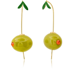 A pair of gold-tone drop earrings designed to look like green olives with small green leaves on top and tiny orange-red gemstone eyes, shown on a white background.