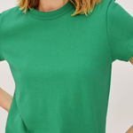 close up of woman in green t-shirt 