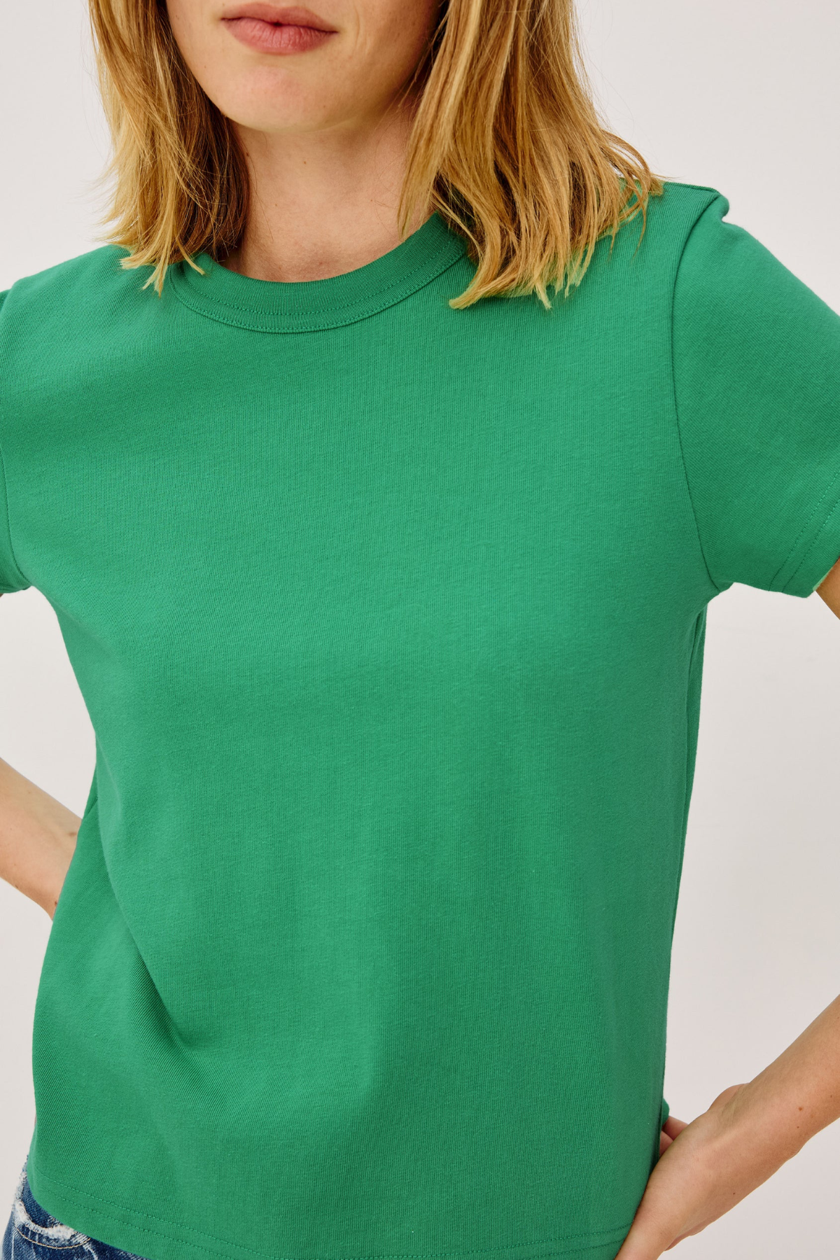 close up of woman in green t-shirt 