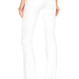 White pants worn by a person on a white background