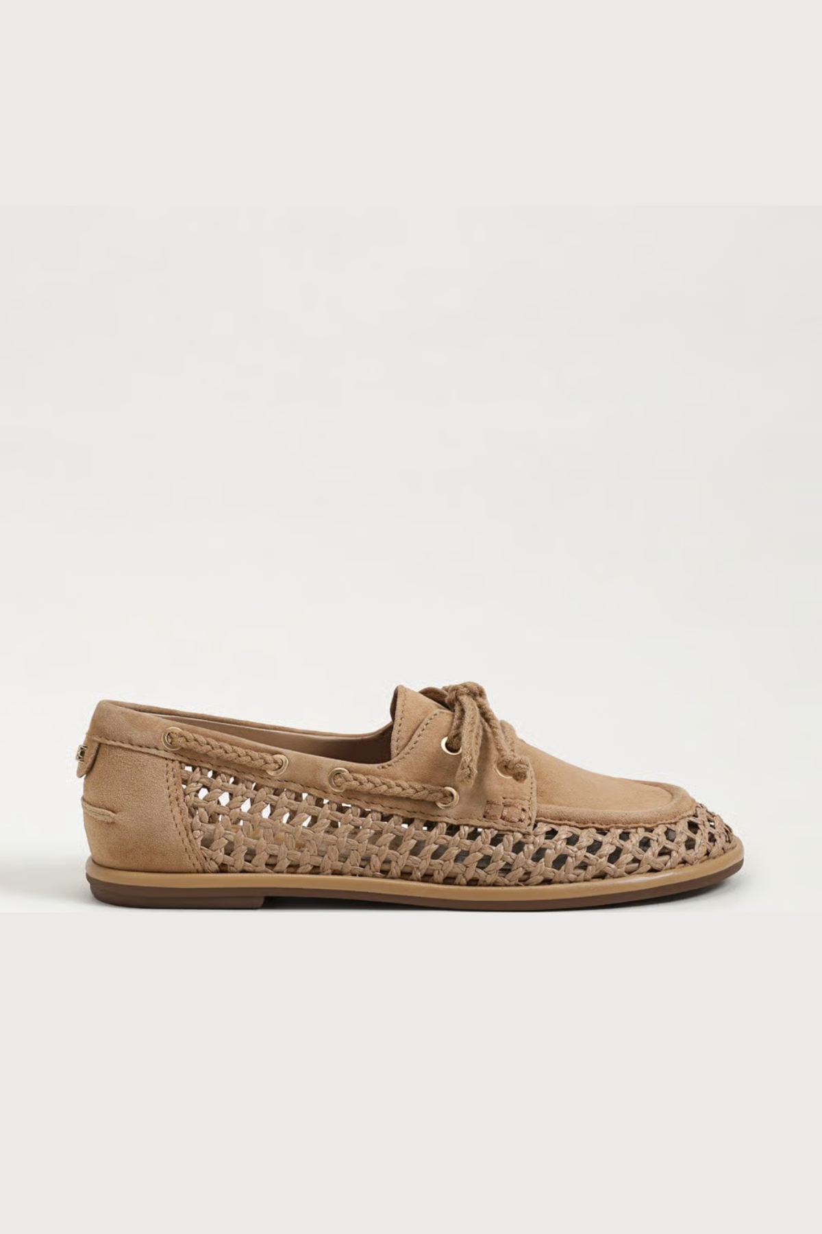 side view of brown flat shoes on white background 