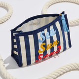 Striped pouch with 'Sea Sun Sand' text on a white background