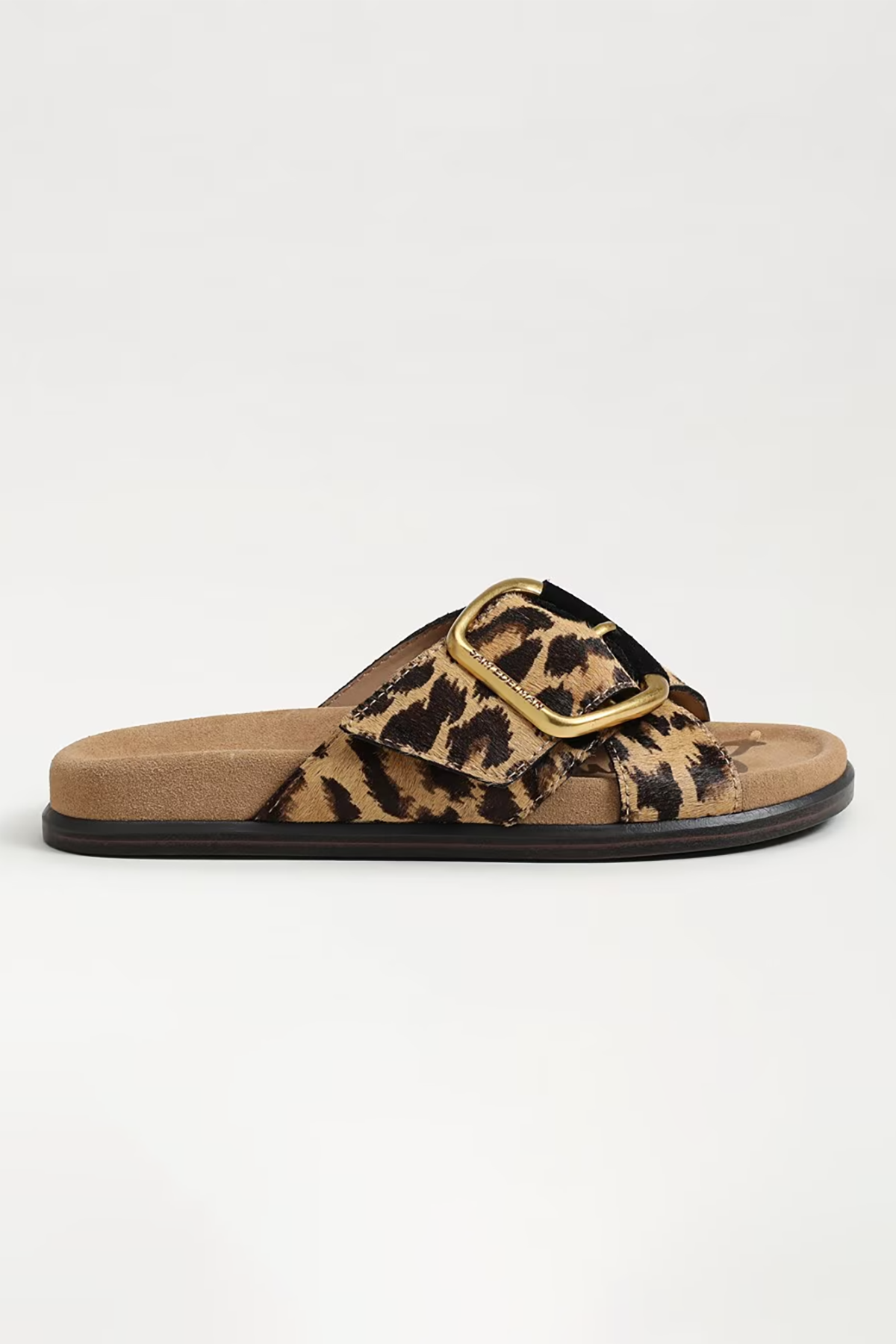 Leopard print slide sandal with a gold buckle on a white background