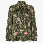 Women's printed style featuring an earthy multicolor pattern and feminine silhouette.