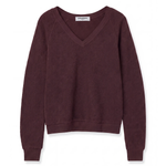 A dark plum purple V-neck knit sweater with long raglan sleeves, shown flat against a plain white background.
