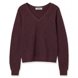 A dark plum purple V-neck knit sweater with long raglan sleeves, shown flat against a plain white background.