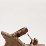 side view stone and raffia womens wedge shoe 