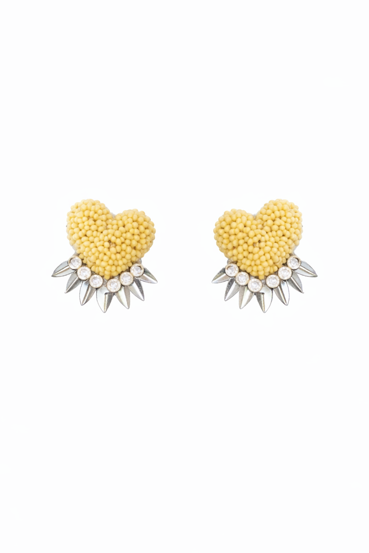 Heart-shaped yellow earrings with spike details on a white background