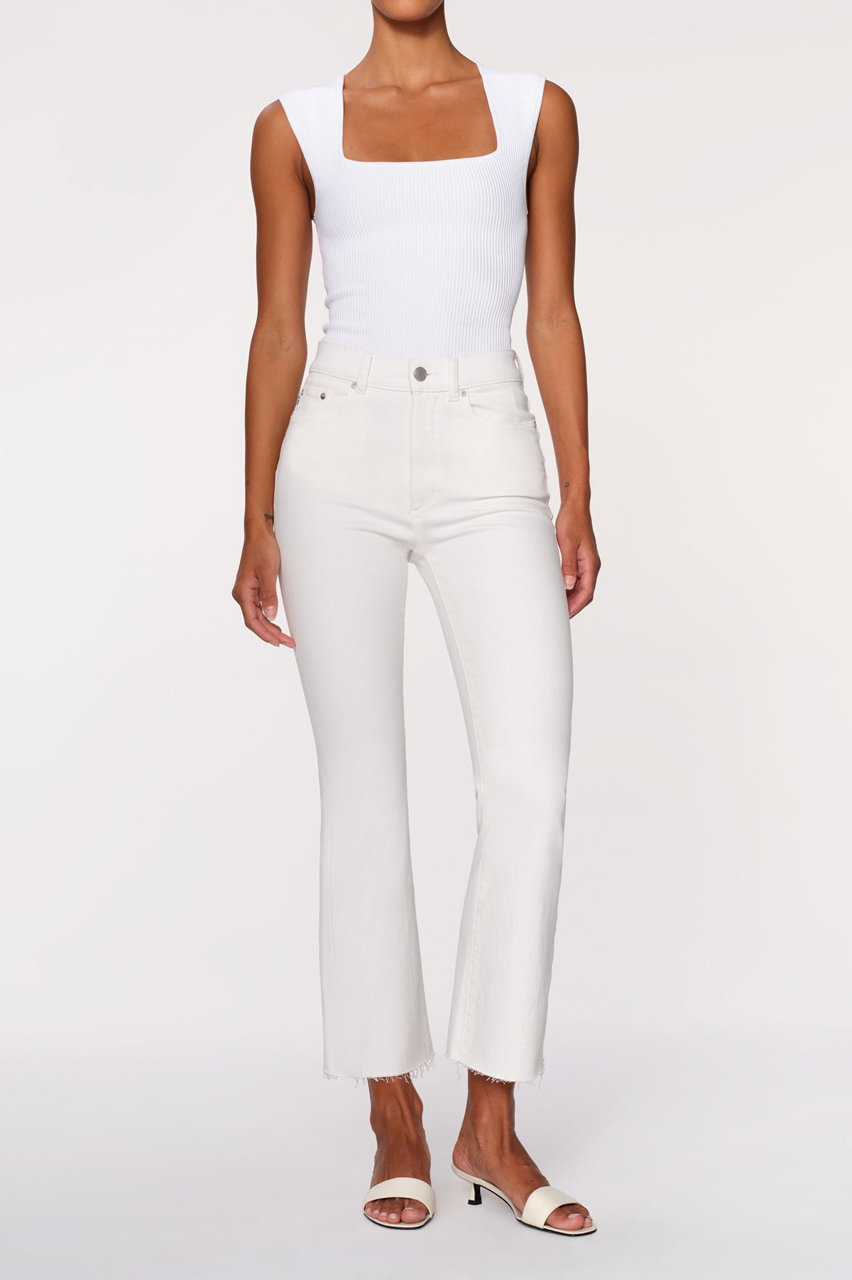 woman in white denim on a white background 