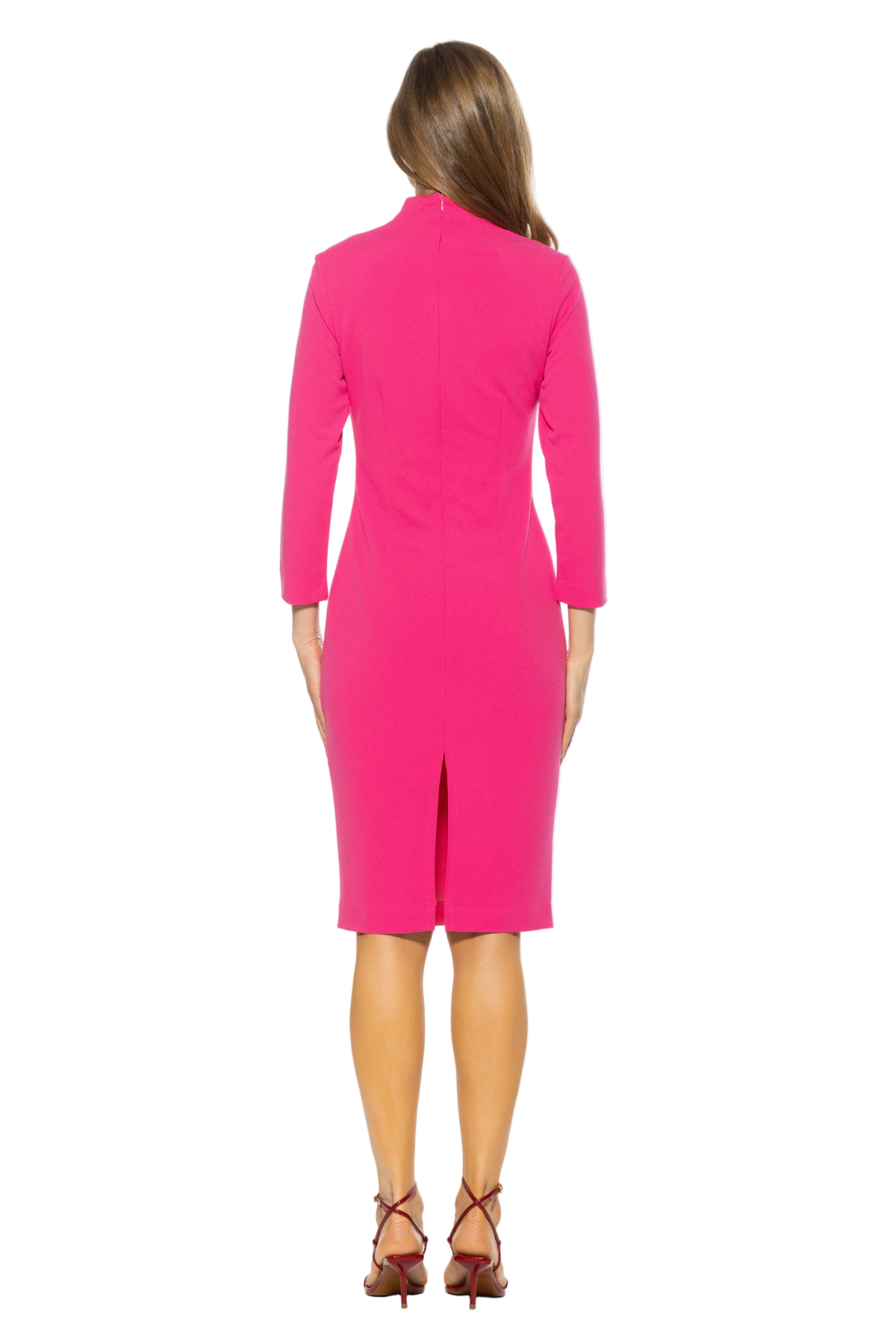 Woman wearing a bright pink dress on a white background