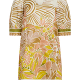 Floral patterned dress with gold accents on a white background