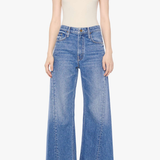Model wearing light-wash straight-leg denim jeans with a cropped ankle-length silhouette.
