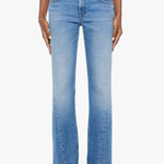Model wearing light-wash denim jeans with twisted seam detailing and a relaxed straight-leg fit.
