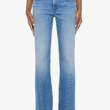 Model wearing light-wash denim jeans with twisted seam detailing and a relaxed straight-leg fit.