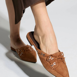 Women's flat shoe featuring a sleek, refined silhouette.