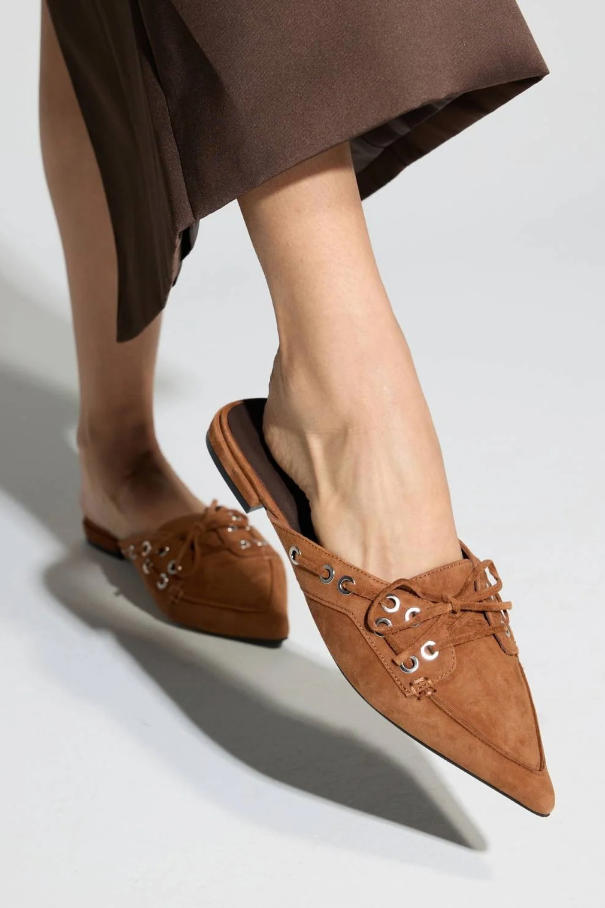 Women's flat shoe featuring a sleek, refined silhouette.