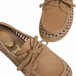 close up womens woven boat shoe on white background 
