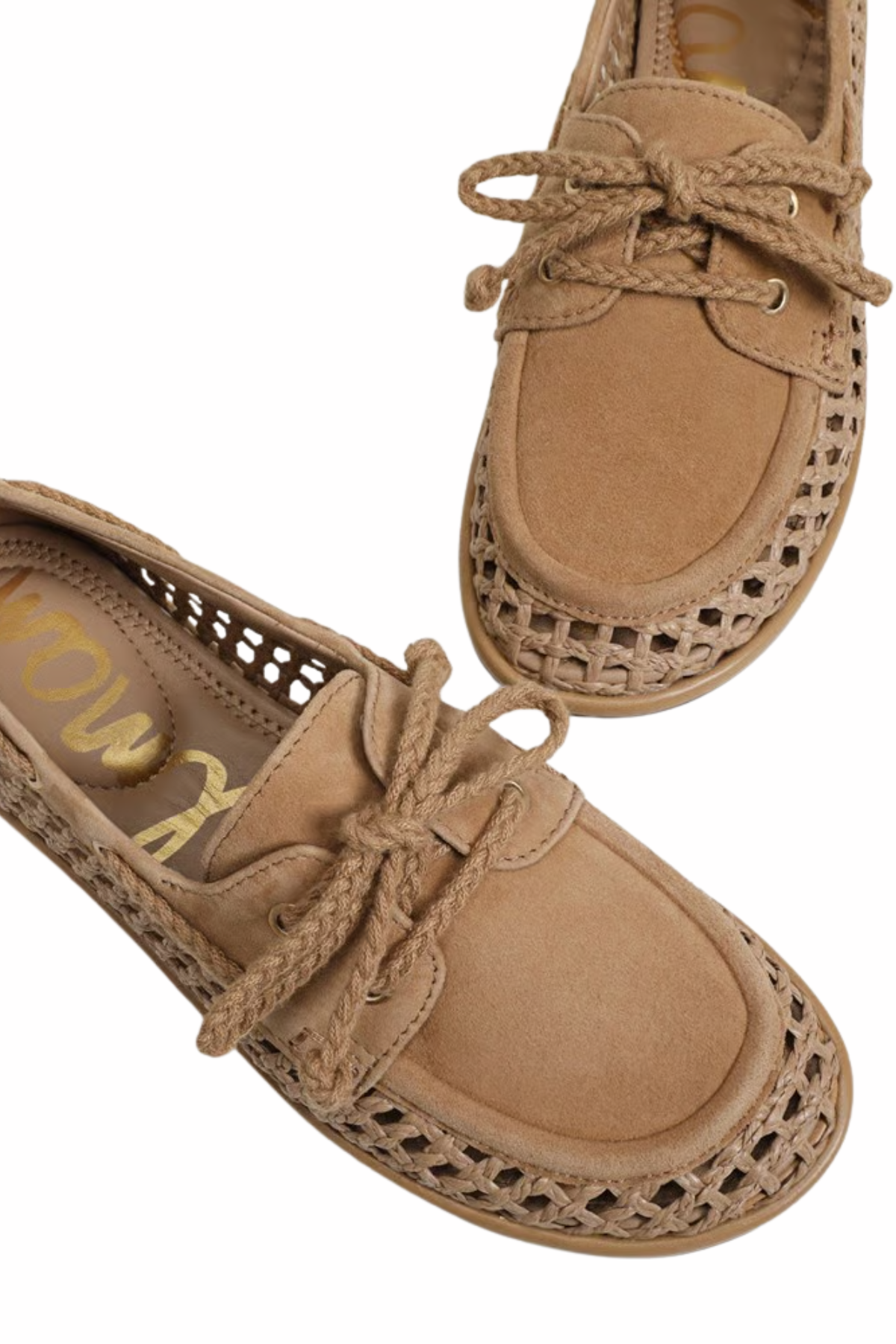 close up womens woven boat shoe on white background 
