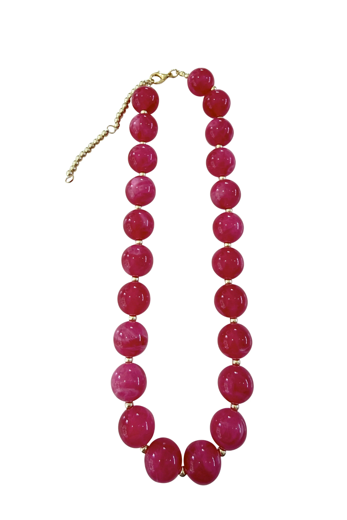 A chunky beaded necklace featuring large, glossy round magenta-pink beads separated by small gold spacer beads, with a gold-tone clasp and extender chain, shown on a plain white background.
