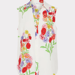 White sleeveless top with colorful floral pattern on a white background