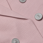 Tailored blazer with clean lines in a soft pink tone