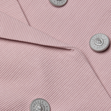 Tailored blazer with clean lines in a soft pink tone