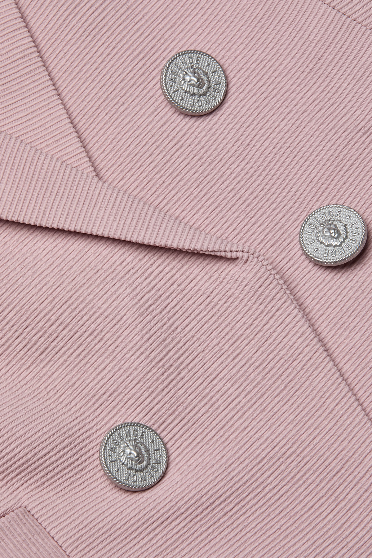 Tailored blazer with clean lines in a soft pink tone