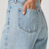 Light blue denim skirt with a white background