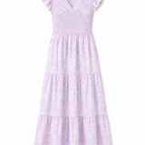 Women's lavender tiered midi dress featuring a flowing silhouette and feminine ruffle details.