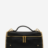 A black leather top-handle handbag with gold-tone hardware, including a top zipper, double zipper pulls, chain shoulder straps, and rivet details, shown against a plain white background.