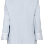 Light blue blazer with white collar and cuffs on a white background