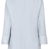 Light blue blazer with white collar and cuffs on a white background