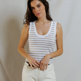 woman in stripe tank on draped background 