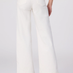 White wide-leg pants worn by a person on a white background