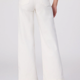 White wide-leg pants worn by a person on a white background