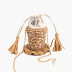 Handbag with sequin embellishments and tassels on a white background