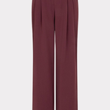 A pair of high-waisted, wide-leg trousers in a deep burgundy or maroon color, shown against a plain light gray background.