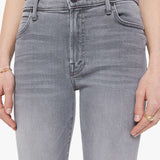 Woman wearing grey straight-leg jeans with a soft, structured fit and clean lines