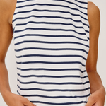 Person wearing a striped tank top with blue and white horizontal stripes on a plain background
