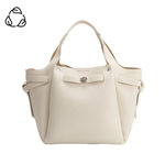 Beige handbag with a visible brand logo on a white background