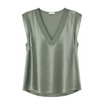 Green sleeveless top on a white background
