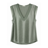 Green sleeveless top on a white background