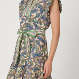 A sleeveless knee-length dress with a high mock neck, ruffled cap sleeves, and a matching waist tie, featuring an intricate paisley pattern in green, blue, and beige on a white base.