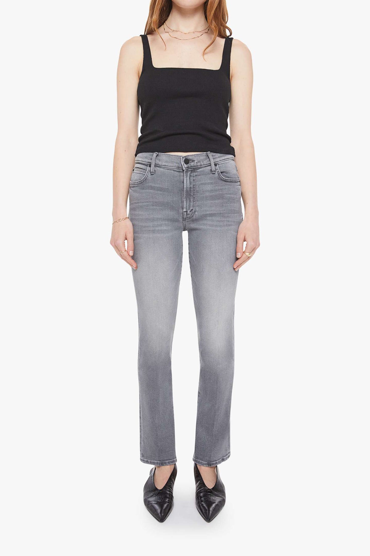 Woman wearing grey straight-leg jeans with a soft, structured fit and clean lines