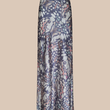 Long floral-patterned skirt on a beige background